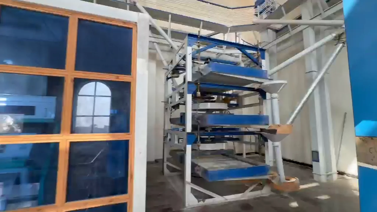Wide view of the processing floor inside Eagle Rice Mills